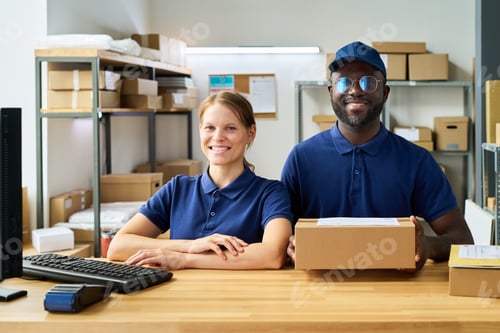 Preview: Caucasian Young Woman and Black Young Man Working Together in Delivery Office