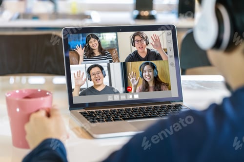 Preview: Rear View of Asian Business man say hello with teamwork colleague in video conference