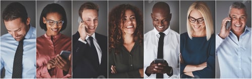 Preview: Smiling group of diverse businesspeople using cellphones
