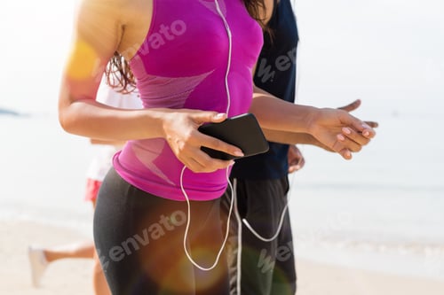 Preview: Group Of People Runners On Beach Closeup Of Young Sport Runners Jogging Together Working Out At