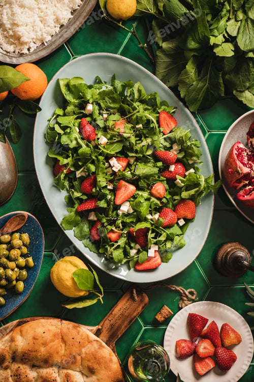 Preview: Turkish Mediterranean dinner table setting with salad, pilav and flatbread
