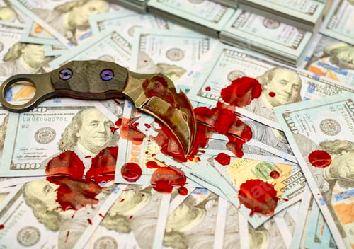 Preview: knife on stack bundles of 100 US dollars