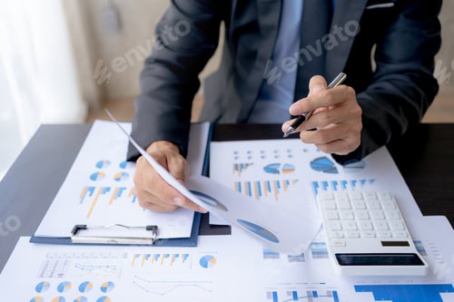 Preview: Financial Analysis with Charts and Graphs at Desk