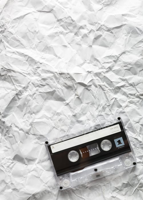 Preview: Audio cassette is lying on the paper
