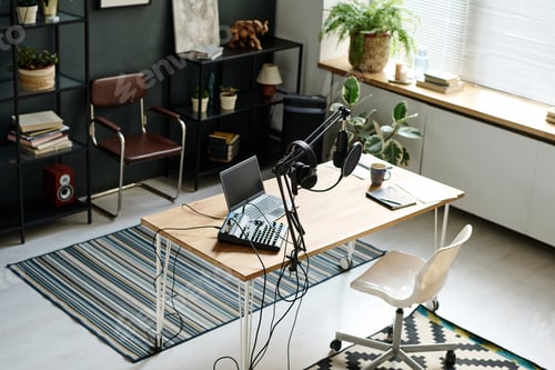Preview: Above angle of workplace of radio presenter with various equipment