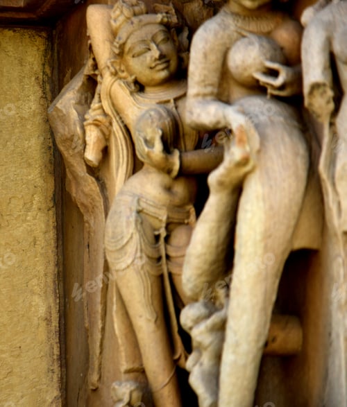 Preview: Sculpture of erotic woman on Khajuraho Temple.