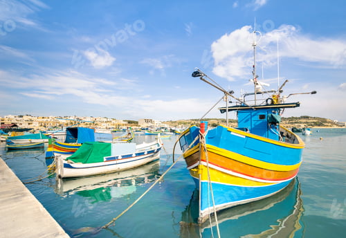 Preview: Colorful typical boats in Marsaxlokk in the island of Malta