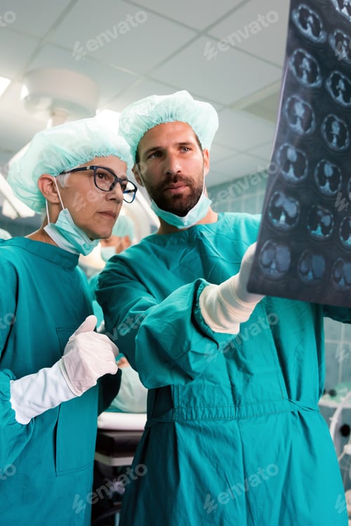 Preview: Doctors examining x-ray images of patient for diagnosis. Healthcare, surgery, radiology concept