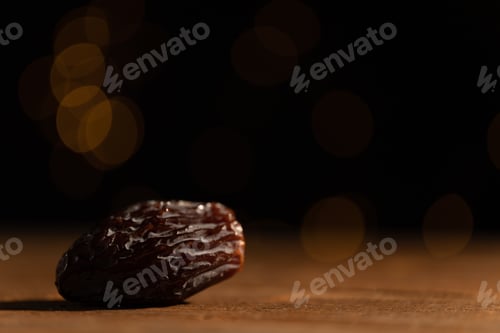 Preview: A single date on a wooden table