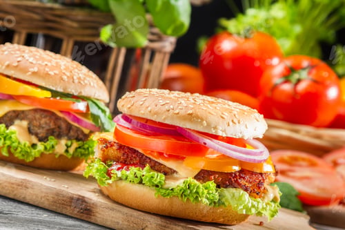 Preview: Closeup of two homemade hamburgers made from fresh vegetables