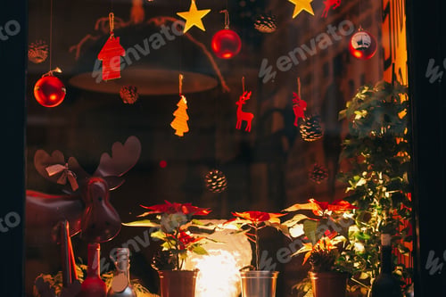 Preview: Christmas decorations, reindeer toys, christmas trees, pine cones, lights in window