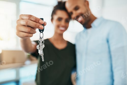 Preview: Take the step towards a fresh start. Portrait of a young couple holding the keys to their new home.
