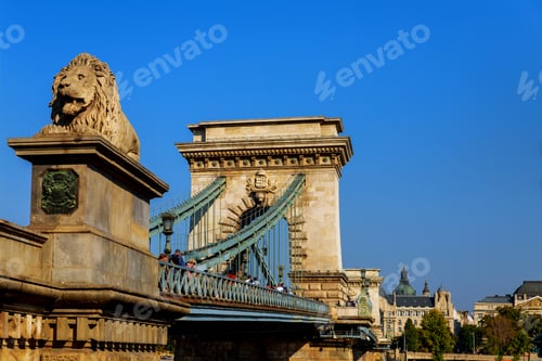 Preview: Budapest, capital of Hungary, is spanned by Szechenyi Chain Bridge Lion across a River Danube.