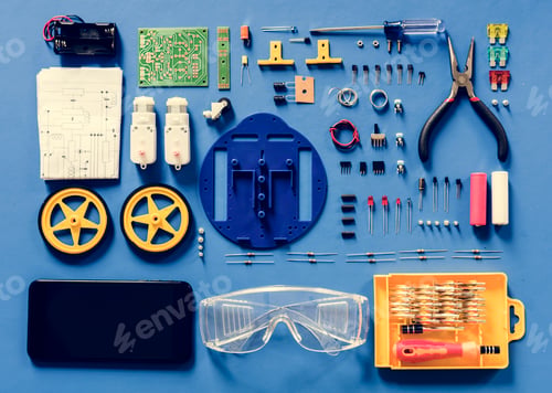 Preview: Aerial view of electronics tools equipments on blue background