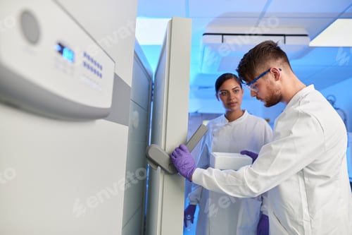 Preview: Scientists in laboratory using scientific equipment