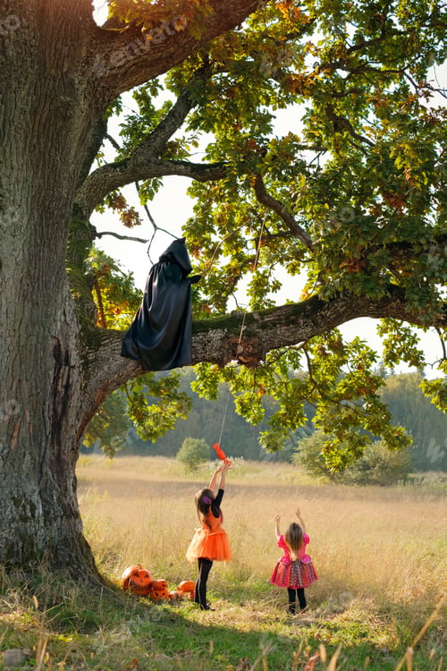 Preview: Grim reaper sits on a tree and teases the kids with a candy tied to a fishing rod