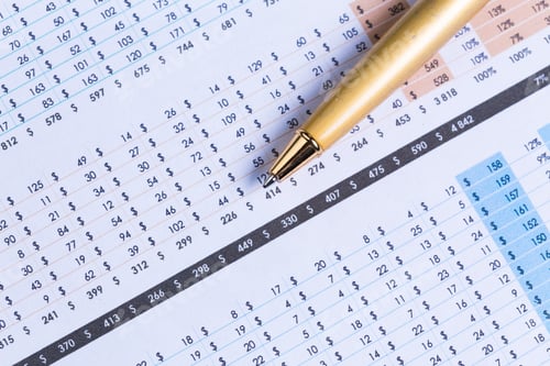 Preview: Business performance graph with ballpoint pen