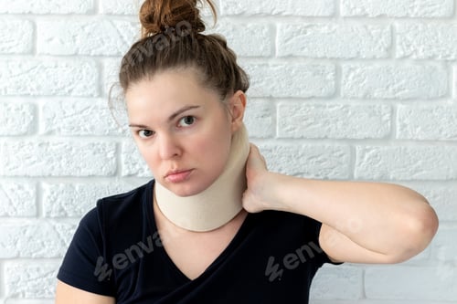 Preview: Woman with cervical surgical collar