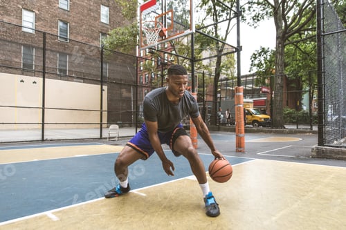 Preview: Basketball player training outdoors