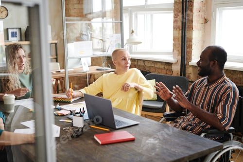 Preview: Business peole discussing at meeting