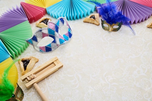 Preview: Purim Festive Setup. Colorful Purim scene with masks,