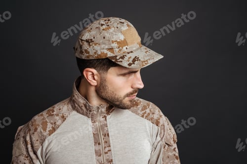 Preview: Close up of a handsome pensive young military man