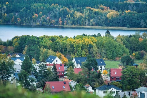 Preview: Beautiful view of a landscape with many buildings surrounded by trees and greenery