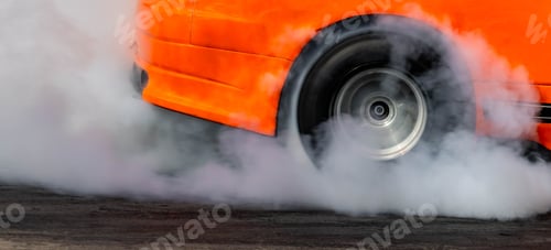 Preview: Car burnout wheels tire with white smoke,Car wheel burnout with smoke from the spinning tyre.