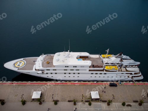 Preview: aerial view of luxury yacht in port