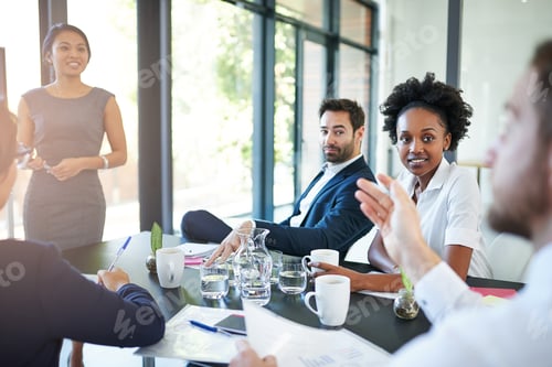 Preview: Just a quick question...Cropped shot of a businesswoman giving a presentation in the boardroom.