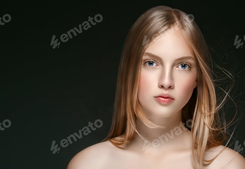Preview: Beautiful Blonde Woman Beauty Model Girl with perfect makeup over black background.