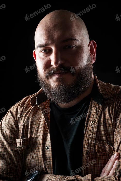 Preview: Portrait of a bald man in a shirt with a beard
