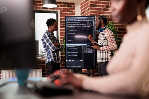Preview: Programming engineers analyzing html code
