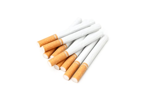 Preview: Concept of harm of smoking, cigarettes isolated on white background