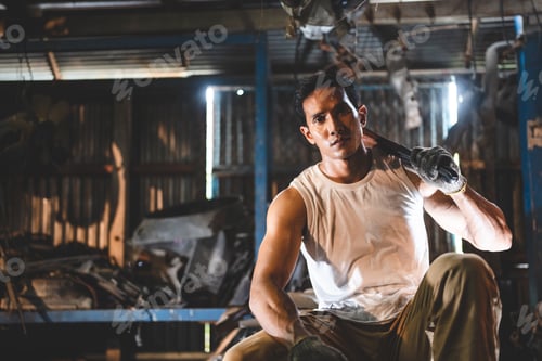 Preview: Vehicle automotive service guy worker doing check or mend car wheel, Asian mechanic repairman