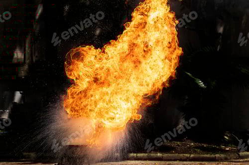 Preview: Flames caused by the explosion of the oil. Demonstration of water on oil fire.
