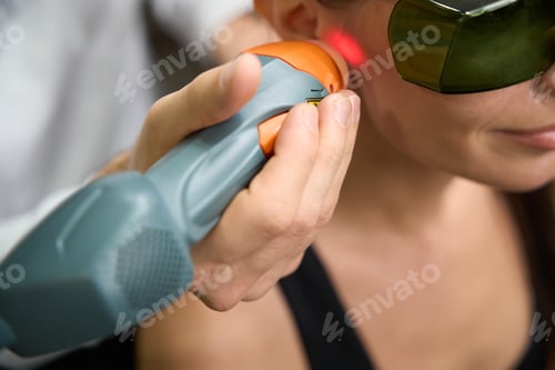 Preview: Lady on treatment with ultrasound machine in clinic