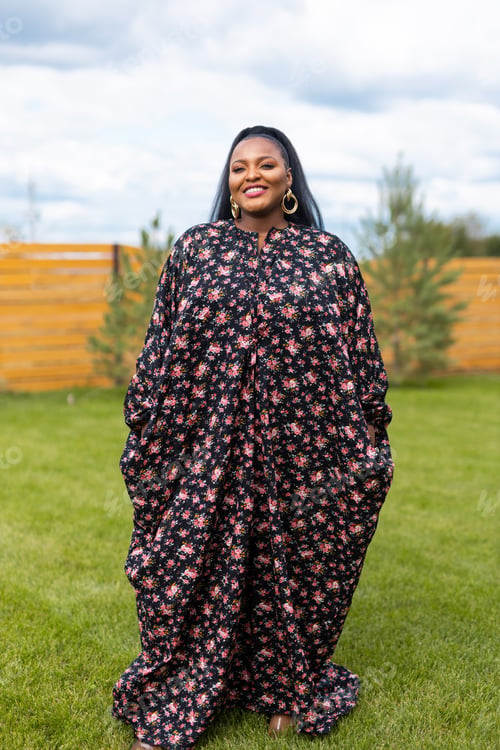 Preview: Portrait of beautiful african american woman having fun on village or suburbian. Outdoor portrait of