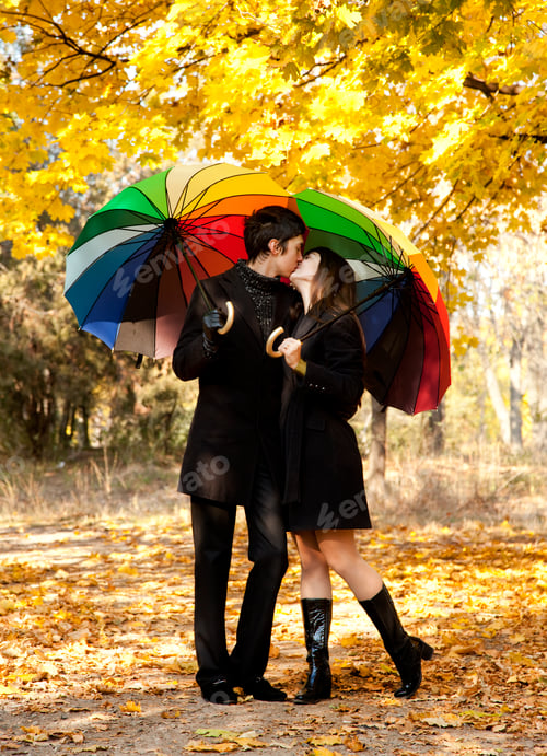 Preview: Couple kissing at alley in the park.