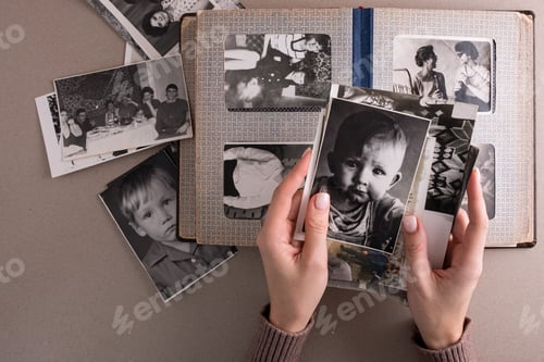 Preview: BAKU, AZERBAIJAN-June 18, 2024. Printed vintage black and white retro photos. Memories nostalgia