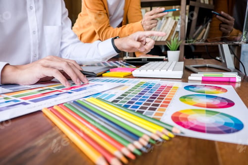 Preview: Two colleague creative graphic designer working on color selection and color swatches