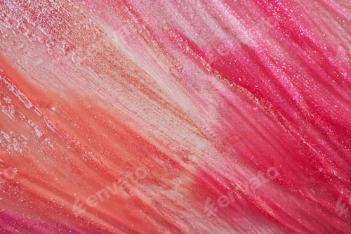 Preview: Vibrant pink and red abstract lip gloss texture with glittering highlights