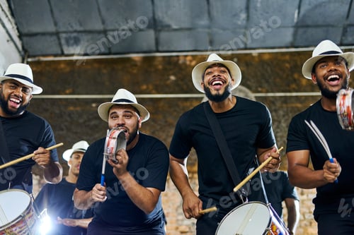 Preview: Shot of a group of musical performers playing together indoors