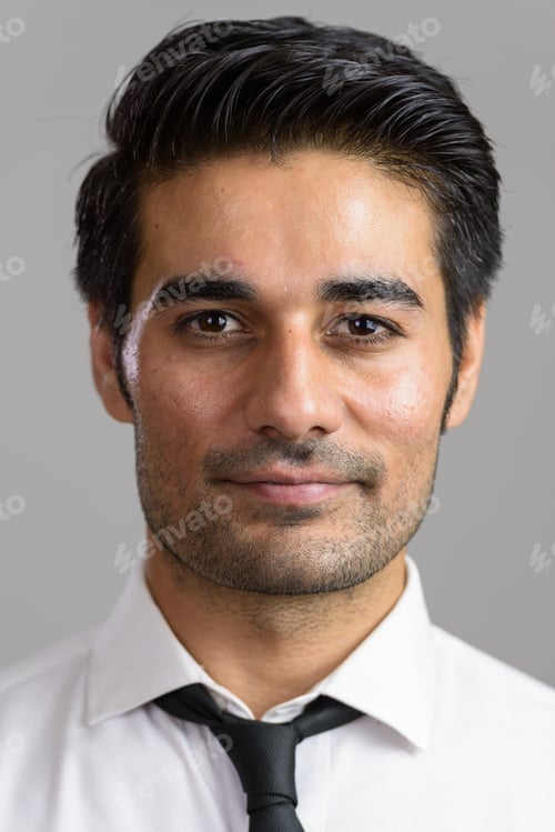 Preview: Young handsome Persian man against white background