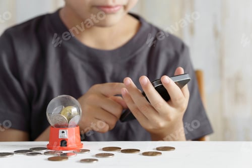 Preview: A Japanese elementary school boy tries to charge for a smart phone game