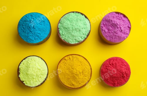 Preview: Colorful powders in bowls on yellow background, flat lay. Holi festival celebration