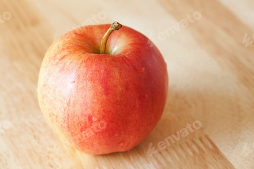 Preview: Apple on rustic wood background