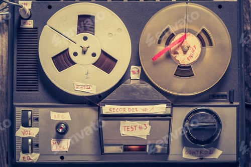 Preview: Top view of reel audio recorder with rolls of tape