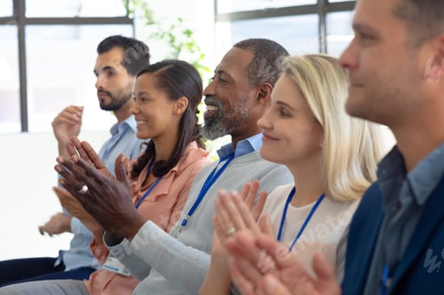 Preview: Business professionals at a conference