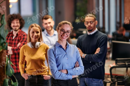 Preview: Portrait of successful creative business team looking at camera and smiling. Diverse business people